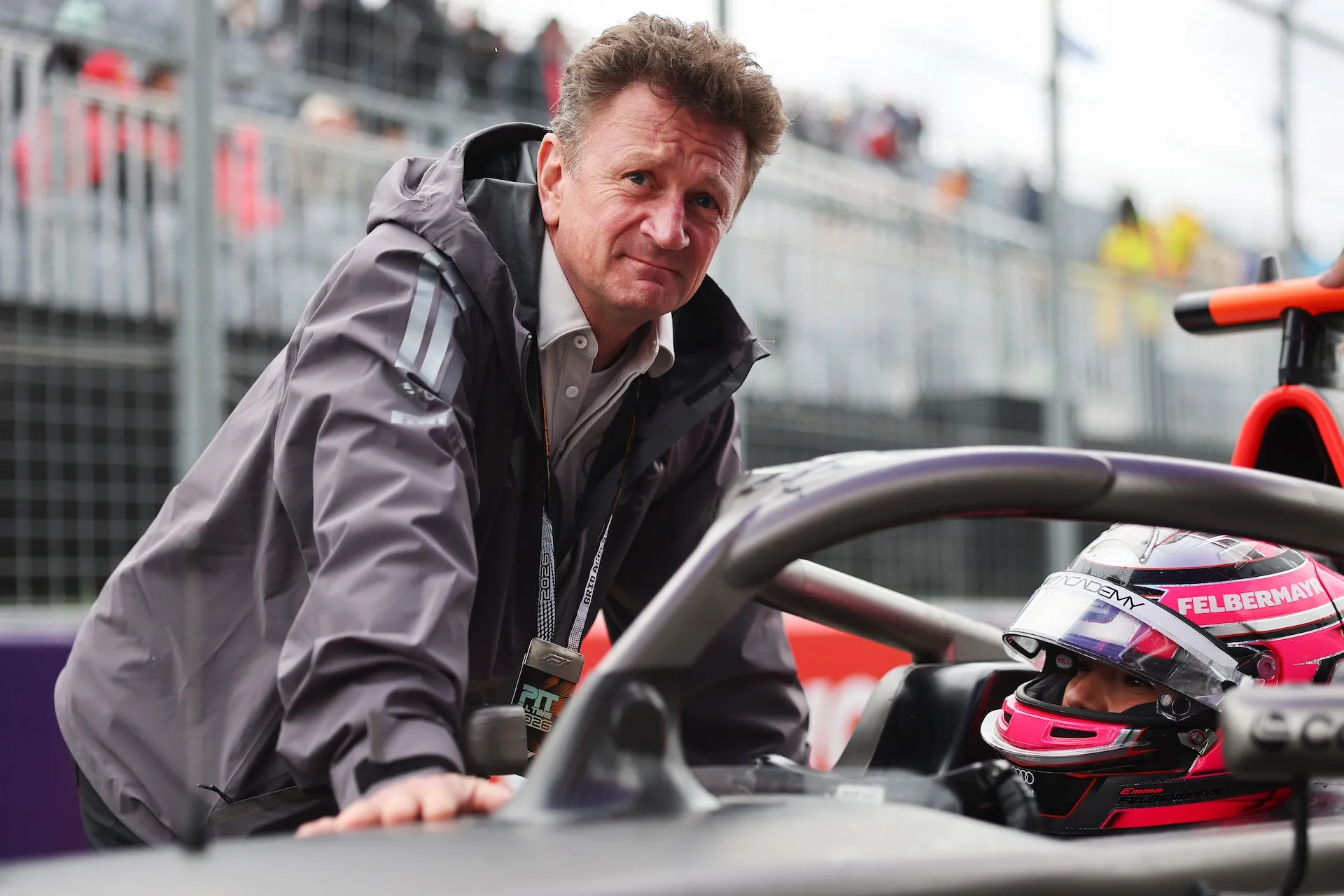 MONTREAL, QUEBEC - MAY 24: Allan McNish, Racing Director of Audi F1 Team talks with Emma Felbermayr of Austria and Rodin Motorsport (5) and Audi F1 Team on the grid during F1 Academy Round 2, race 3 at Circuit Gilles Villeneuve on May 24, 2026 in Montreal, Quebec. (Photo by Andy Hone/LAT Images)