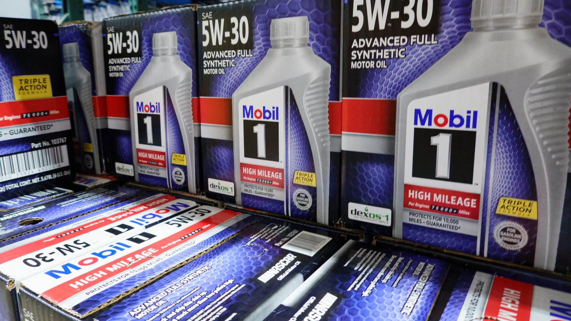 SAN DIEGO, CALIFORNIA - MARCH 11: Cases of Mobil 1 Advanced full synthetic motor oil are stacked at a Costco Wholesale store on March 11, 2025 in San Diego, California..