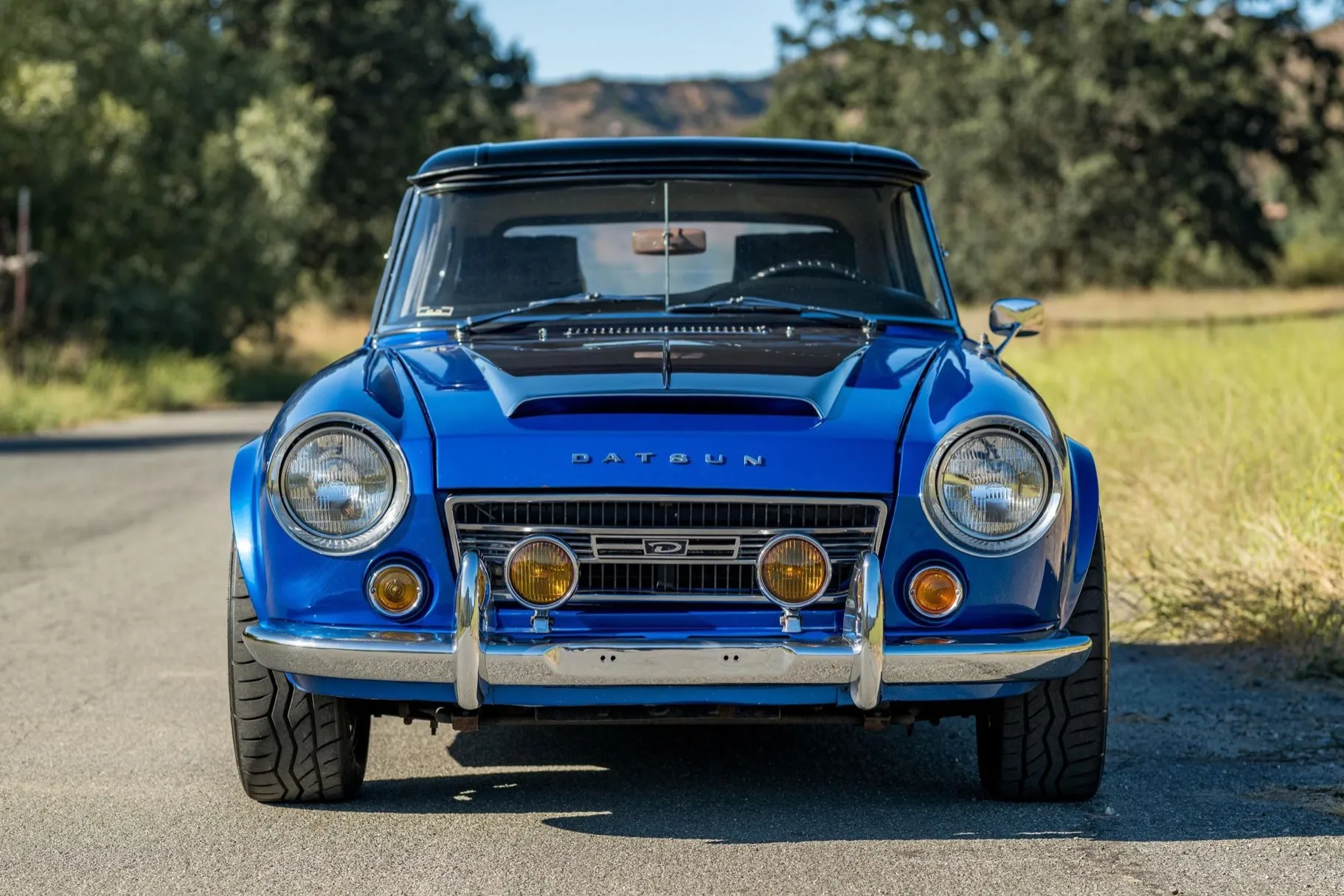 1967.5 Datsun 2000 Roadster with matching Hot Wheels