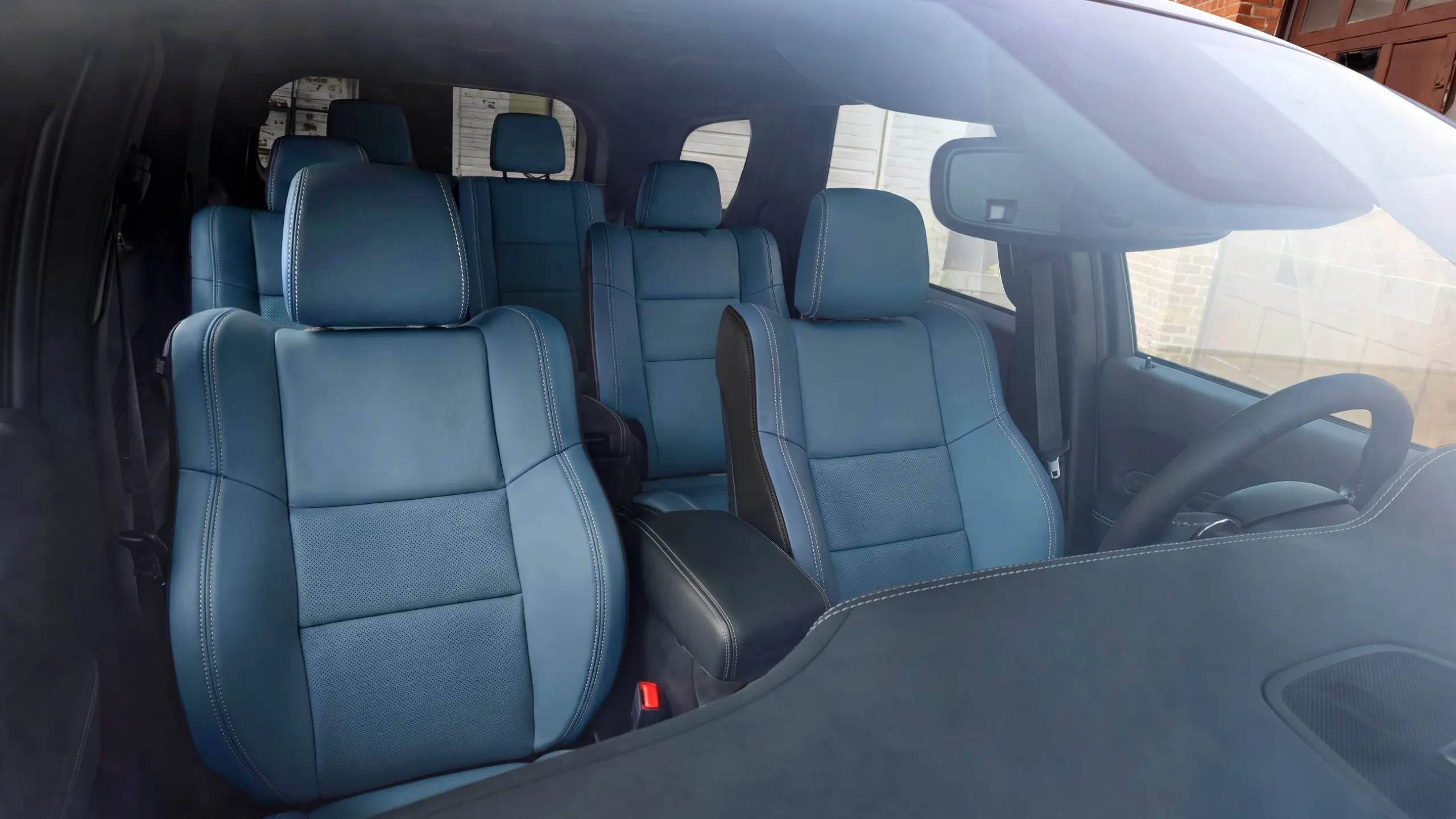 The new Dodge Durango R/T 392 Smokescreen Concept features Petrol Blue Laguna leather performance seats with dual silver stitching.