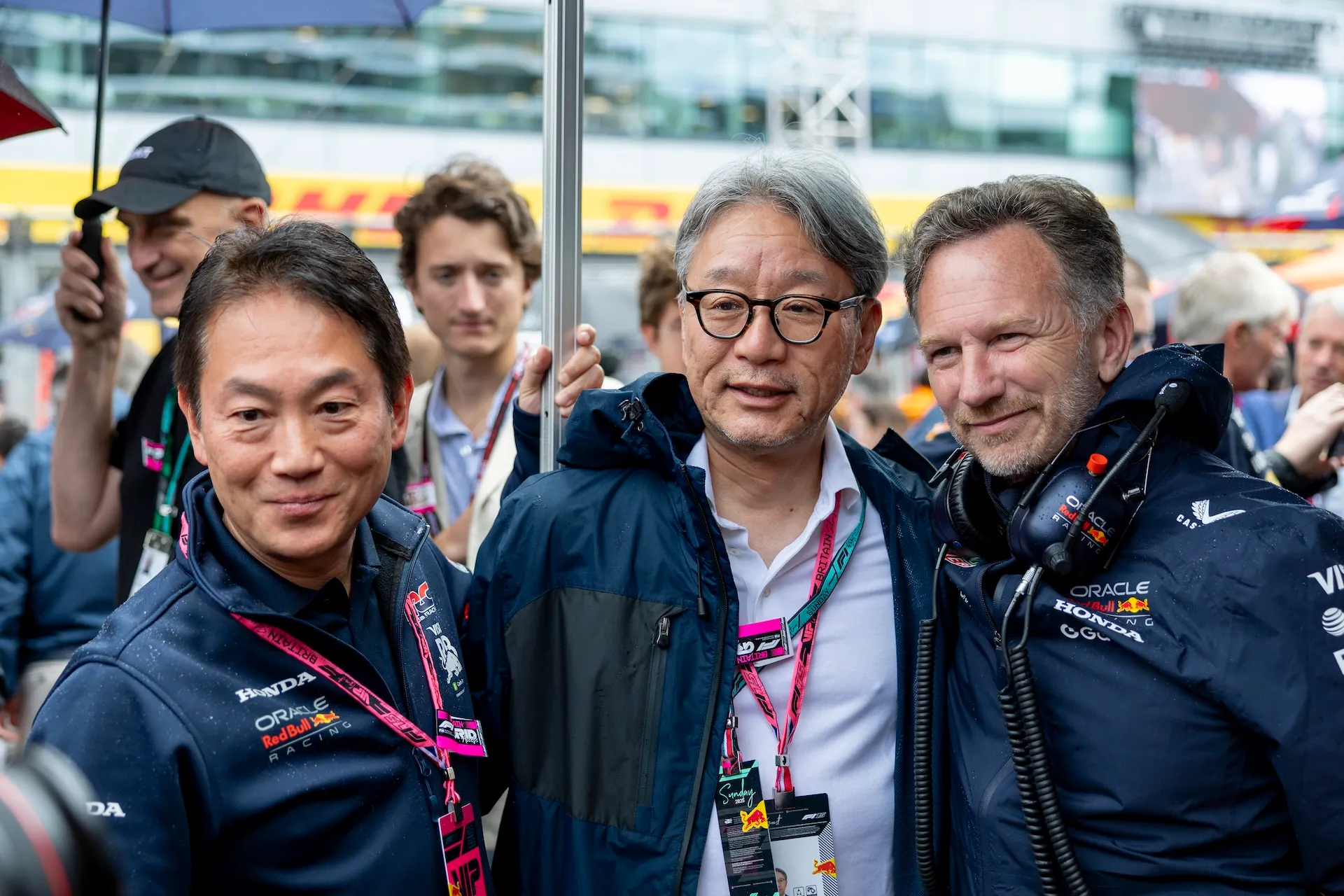 NORTHAMPTONSHIRE, ENG - JULY 06: Honda executives Koji Watanabe, President of Honda Racing Corporation, and Toshihiro Mibe, President & CEO of Honda Motor Corporation pose with Red Bull Racing Team Principal Christian Horner on the grid before the F1 Grand Prix of Great Britain on July 06, 2025 at Silverstone Circuit in Northampton, England. (Photo by Bob Kupbens/Icon Sportswire)