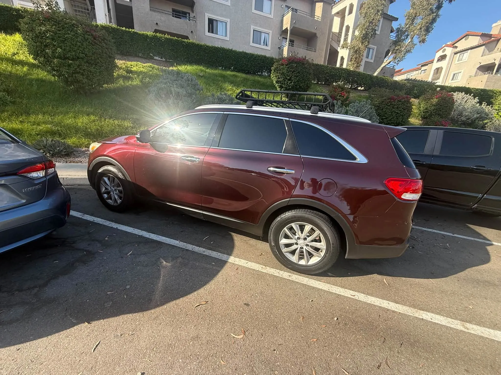 High-mileage 2017 Kia Sorento in a parking lot